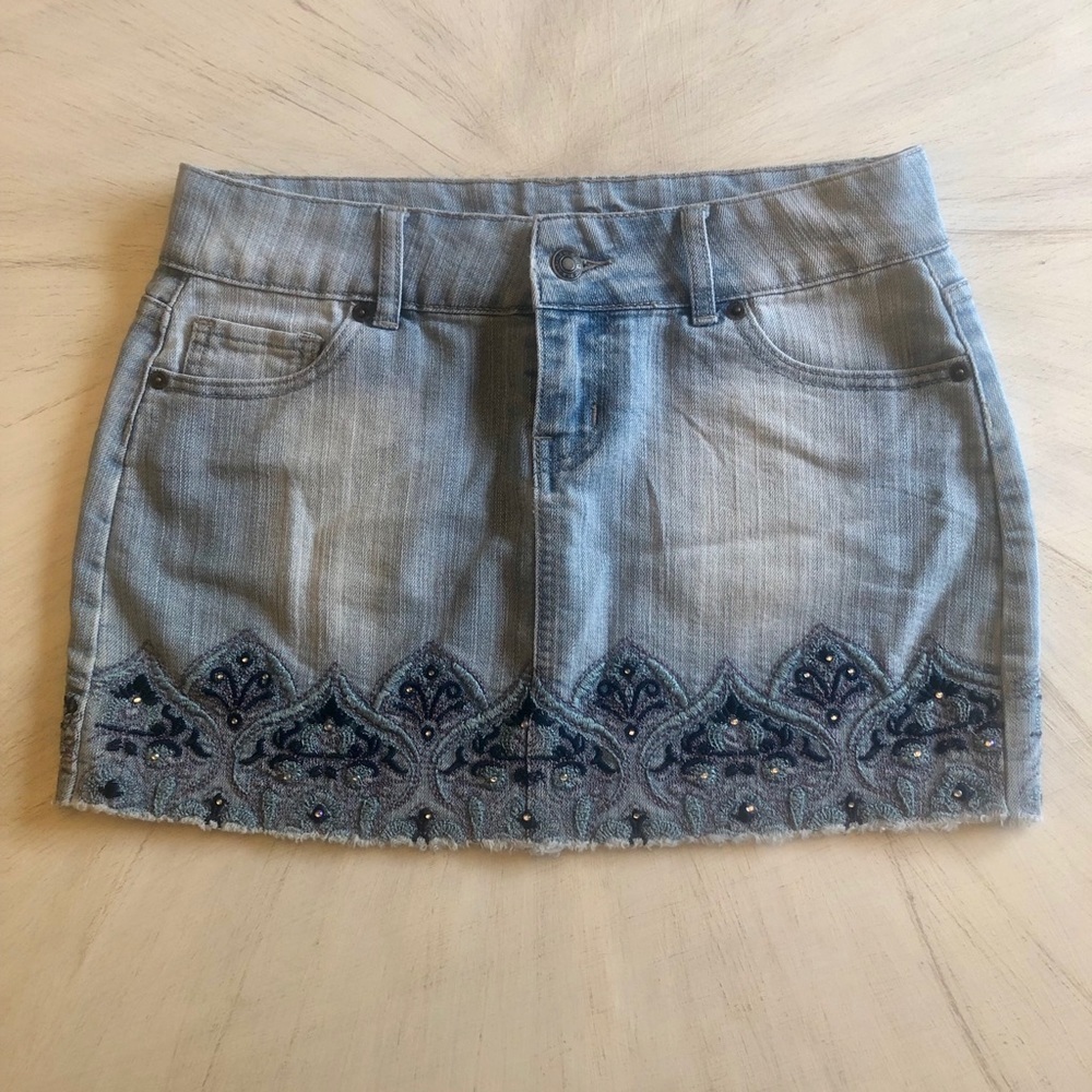 Blue jean mini skirt with embroidered detail